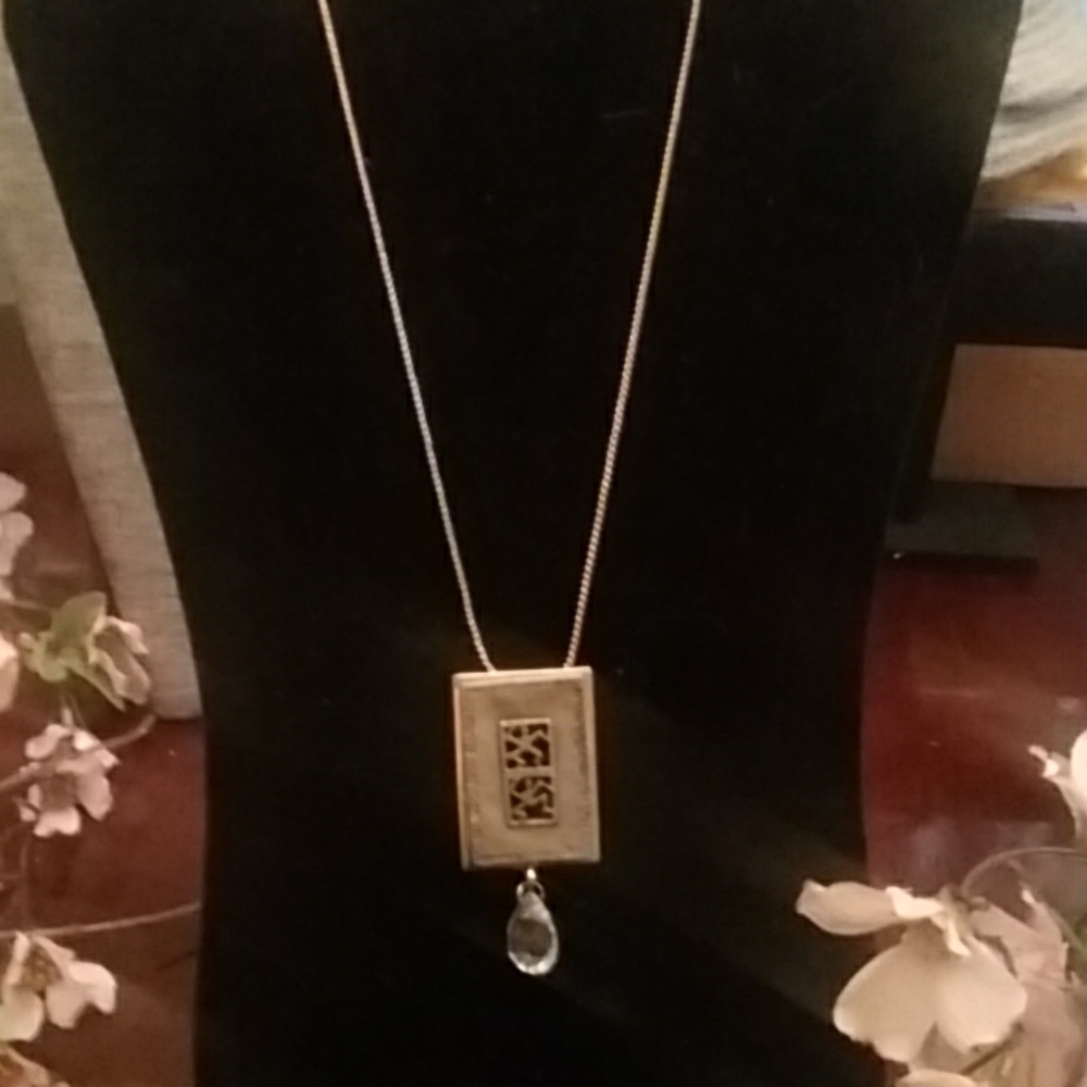 Necklace with hanging pendant